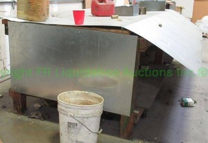 lot 104 image: Galvanized metal covered Large utility table plus contents. 34 x 120 x 44