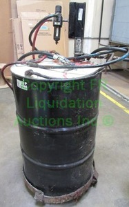 lot 121 image: Glue spray pumpgun system with 55 gallon drum