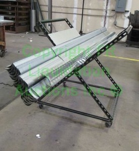 lot 125 image: X frame parts cart with parts. 42 x 37 x 31