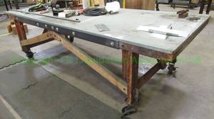 lot 126 image: Metal top wood base rolling utility table. 32 x 46 x 111