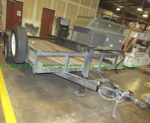 lot 196 image: P.J. Trailers dual axle utility trailer. 14 box length