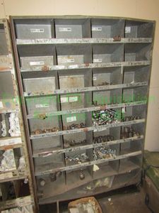 lot 234 image: Metal utility cubby storage unit, contents not included. 75 x 46 x 10