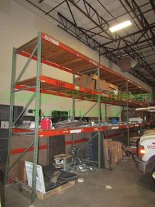 lot 371 image: Pallet rack four sections, 32ft. Contents not included