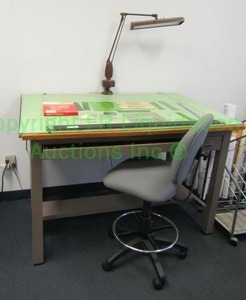 lot 404 image: Mayline company drafting table, lamp and chair. Table is 42 x 60 x 39
