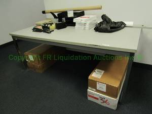 lot 406 image: Laminate top metal base utility table. 29 x 72 x 36