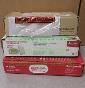 lot 335 image: Honeywell, LG, and Mitsubishi programmable thermostats