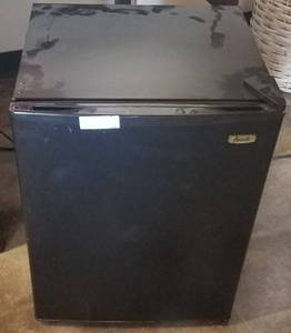 lot 30 image: Avanti 2.5 Cu. Ft. compact refrigerator model 248 YWYB with separate chiller compartment in stylecolorcondition shown. Measures approx. 18.75 wide x 16.75 deep x 25 high.