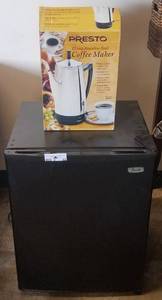 lot 32 image: Avanti 2.5 Cu. Ft. compact refrigerator model 248 YWYB with separate chiller compartment AND Presto 12-cup stainless steel coffee maker in stylecolorcondition shown. Refrigerator measures approx. 18.75 wide x 16.75 deep x 25 high.