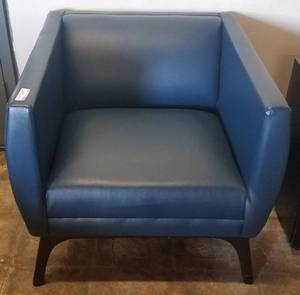 lot 33 image: Leather style chair in stylecolorcondition shown.