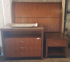 lot 38 image: Bedroom set including matching headboard, 3-drawer granite top dresser  media chest, and 1-drawer nightstand with storage area in stylecolorcondition shown. You are bidding by the piece