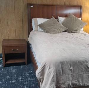 lot 52 image: Headboard with platform bed and nightstand in stylecolorcondition shown. Buyer is responsible for proper disassembly. You are bidding by the piece