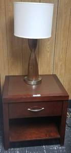 lot 53 image: 1-drawer wooden nightstand with storage area and wood table lamp in stylecolorcondition shown. You are bidding by the piece