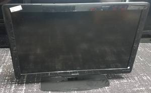 lot 64 image: Philips flat screen TV with remote in stylemodelcondition shown.