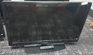 lot 65 image: Philips flat screen TV with remote in stylemodelcondition shown. No power cord.