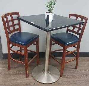 lot 70 image: Granite top with stainless steel frame lounge table and 2 counter height bar stool type chair in stylecolorcondition shown. You are bidding by the piece