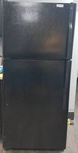 lot 71 image: General Electric refrigerator in stylecolormodel shown. This unit is still plugged in and working. Buyer is responsible for proper disconnection as needed.