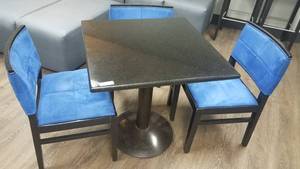 lot 74 image: Granite top with metal frame lounge table and 3 upholstered chairs in stylecolorcondition shown. You are bidding by the piece