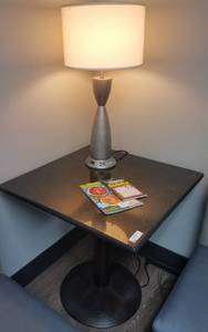 lot 77 image: Granite top with metal frame lounge table and table top lamp in stylecolorcondition shown. You are bidding by the piece