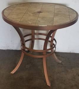 lot 104 image: Round bistro  lounge style table with metal frame in stylecolorcondition shown.