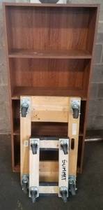 lot 121 image: 2 movers  furniture dollies and 1 bookcase as shown. You are bidding by the piece