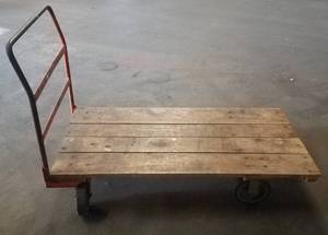 lot 124 image: Flatbed with wooden platform in solid condition as shown.
