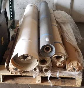 lot 140 image: Lot of assorted rolls of vinyl type material in stylescolors as shown.