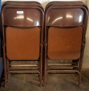 lot 149 image: 8 folding chairs with padded seats as shown. You are bidding by the piece