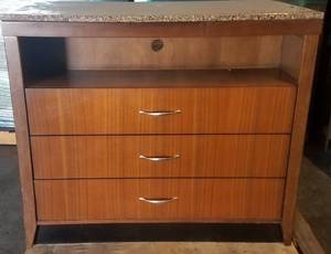 lot 175 image: Granite top DresserMedia Chest in medium finish as shown. Condition varies. Please Note These items will be distributed on a First come - First served basis. You are bidding by the piece