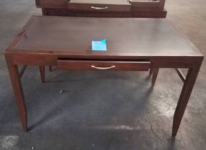 lot 189 image: Desk with drawer in dark finish in stylecolor shown. Condition varies. Please Note These items will be distributed on a First come - First served basis. You are bidding by the piece