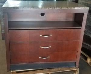 lot 229 image: Granite top dressermedia chest in dark finish in stylecolor shown. Condition varies. Please Note These items will be distributed on a First come - First served basis. You are bidding by the piece