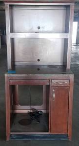 lot 416 image: Granite top cabinet with hutch in dark finish as shown. Condition varies. Please Note These will be distributed on a First come - First served basis. You are bidding by the piece