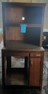 lot 470 image: Granite top cabinet with hutch in dark finish as shown. Condition varies. Please Note These will be distributed on a First come - First served basis. You are bidding by the piece