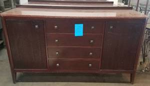 lot 471 image: Pink granite top buffet  credenza in stylecolorcondition shown. Condition varies. Please Note These will be distributed on a First come - First served basis. You are bidding by the piece