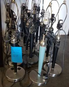 lot 555 image: Black with silver table lamps in stylecolor shown. Condition varies. Please Note These will be distributed on a First come - First served basis. You are bidding by the piece