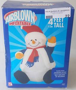 lot 22 image: Large 4 foot tall inflatable snowman in original box as shown.
