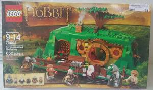 lot 24 image: Lego The Hobbit 79003 An Unexpected Gathering in sealed box as shown. Search it up