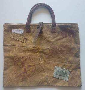 lot 34 image: The Barrel Shack sachel bag in stylecolorcondition shown. Look it up