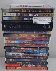 lot 73 image: Lot of DVDs and games as shown.