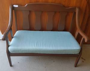 lot 88 image: Mid-century wood bench with upholstered seat cushion as shown.