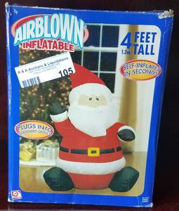 lot 105 image: Inflatable Santa in original box as shown.