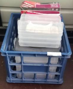 lot 108 image: Crate with plastic storage containers and office supplies as shown.