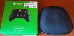 lot 120 image: Xbox wireless controllers as shown. One is new in box. You are bidding by the piece