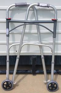 lot 128 image: Folding walker as shown.