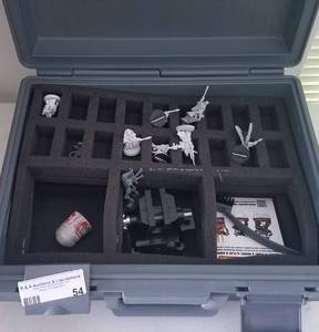 lot 54 image: Warhammer models and such in a Citadel storage case as shown.