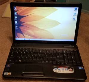 lot 192 image: Toshiba Satellite C655 laptop in working condition as shown. See pictures. NO Power cord.