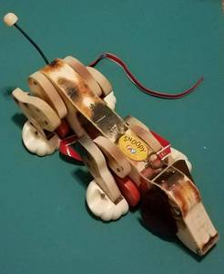 lot 201 image: Vintage Fisher Price Toys Snoopy dog toy in stylecolorcondition as shown.
