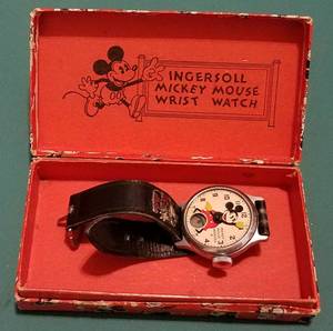 lot 203 image: Vintage Ingersoll Mickey Mouse wrist watch with original box in stylecolorcondition shown. Watch is missing the glass.