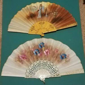 lot 204 image: Lot of 2 vintage hand fans in stylescolorscondition as shown.