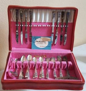 lot 6 image: VINTAGE ONEIDA COMMUNITY SILVERPLATE CORONATION ART DECO FLATWARE SET WITH ORIGINAL STORAGE CASE AND PAPERWORK AS SHOWN. CIRCA 1936. SEARCH IT UP
