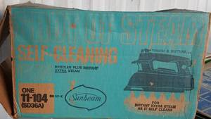 lot 49 image: VINTAGE SUNBEAM SHOT OF STEAM SELF-CLEANING IRON MODEL 11-104 (SD36A) WITH ORIGINAL BOX AND INFO AS SHOWN.